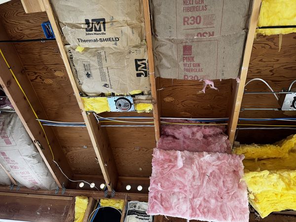 Ceiling insulation with new circuit runs and recessed lighting rough-in