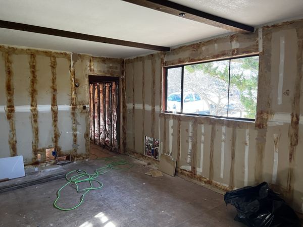 Interior demo with original wiring removed before rewire