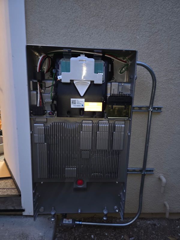Enphase system controller wired with IQ batteries staged in the garage