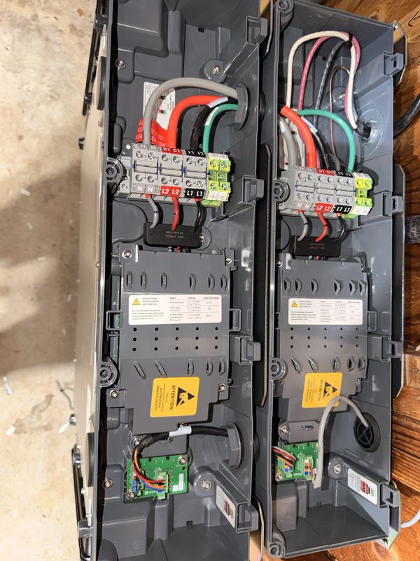 Enphase IQ Batteries open showing internal wiring terminations