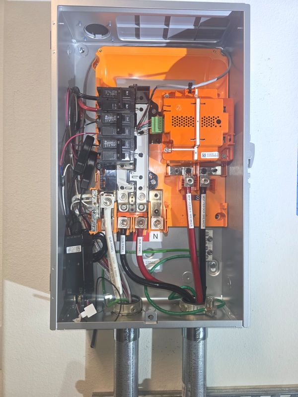 Enphase system controller interior with subpanel feeders terminated
