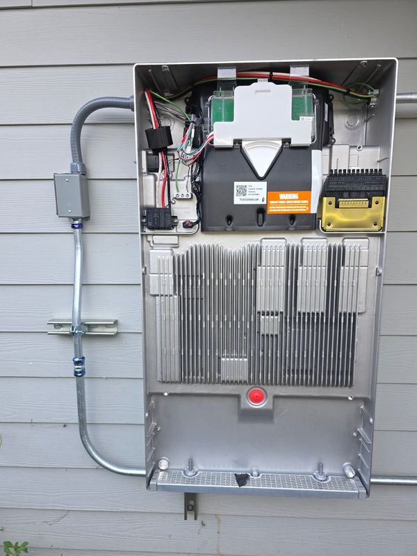 Solar inverter internals with communications board during commissioning
