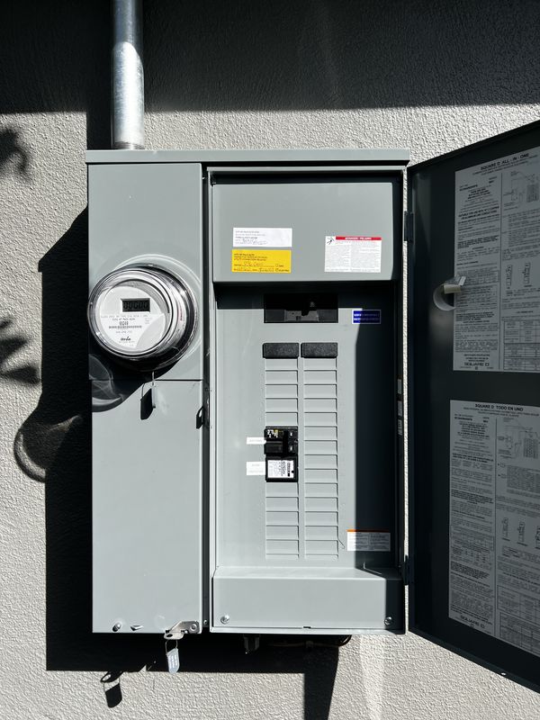 New Square D all-in-one meter-main combo installed outdoors