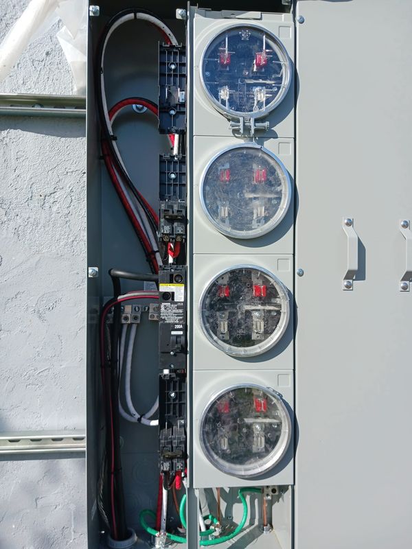 Meter stack interior fully wired with main breaker before meters are installed