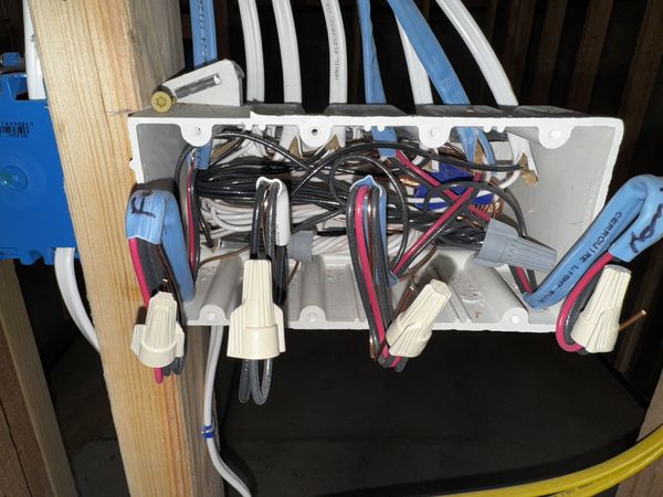 Junction box with conductors made up and capped, ready for rough inspection